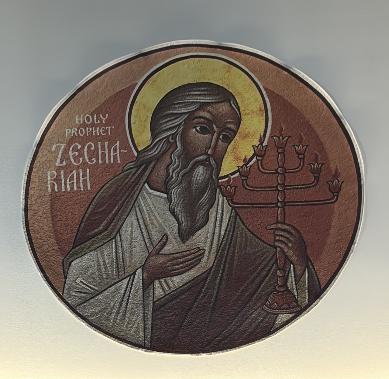 Church icon of the prophet Zechariah holding a seven-branched golden lampstand.